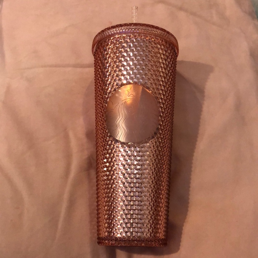 Pink studded Starbucks tumbler